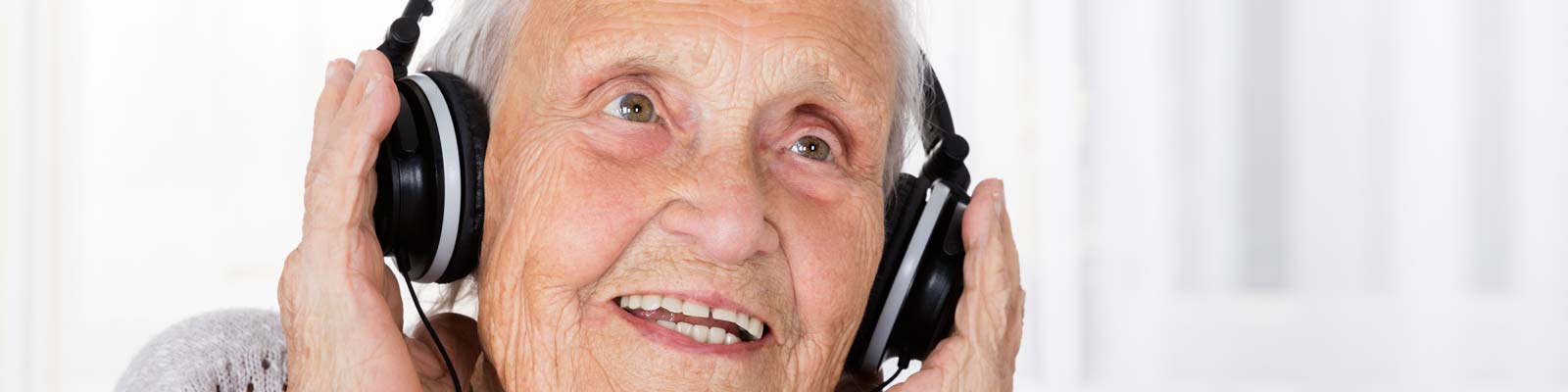 Alzheimer's patient enjoying music - Browse the Alzheimer's Store - The best simple music players and easy to use music related products for those with Alzheimer's, Dementia, Stroke, Memory Loss and for Senior Care